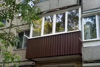 Остекление балкона профилем Рехау Delight 70