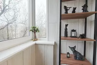 Вертикальная укладка ламината на Г-образном балконе с утеплением