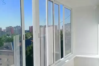 Остекление балкона и отделка стен