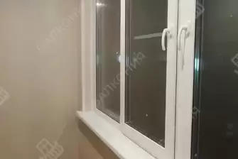 Остекление балкона и балконного блока профилем Рехау 60 и отделка панелями ПВХ